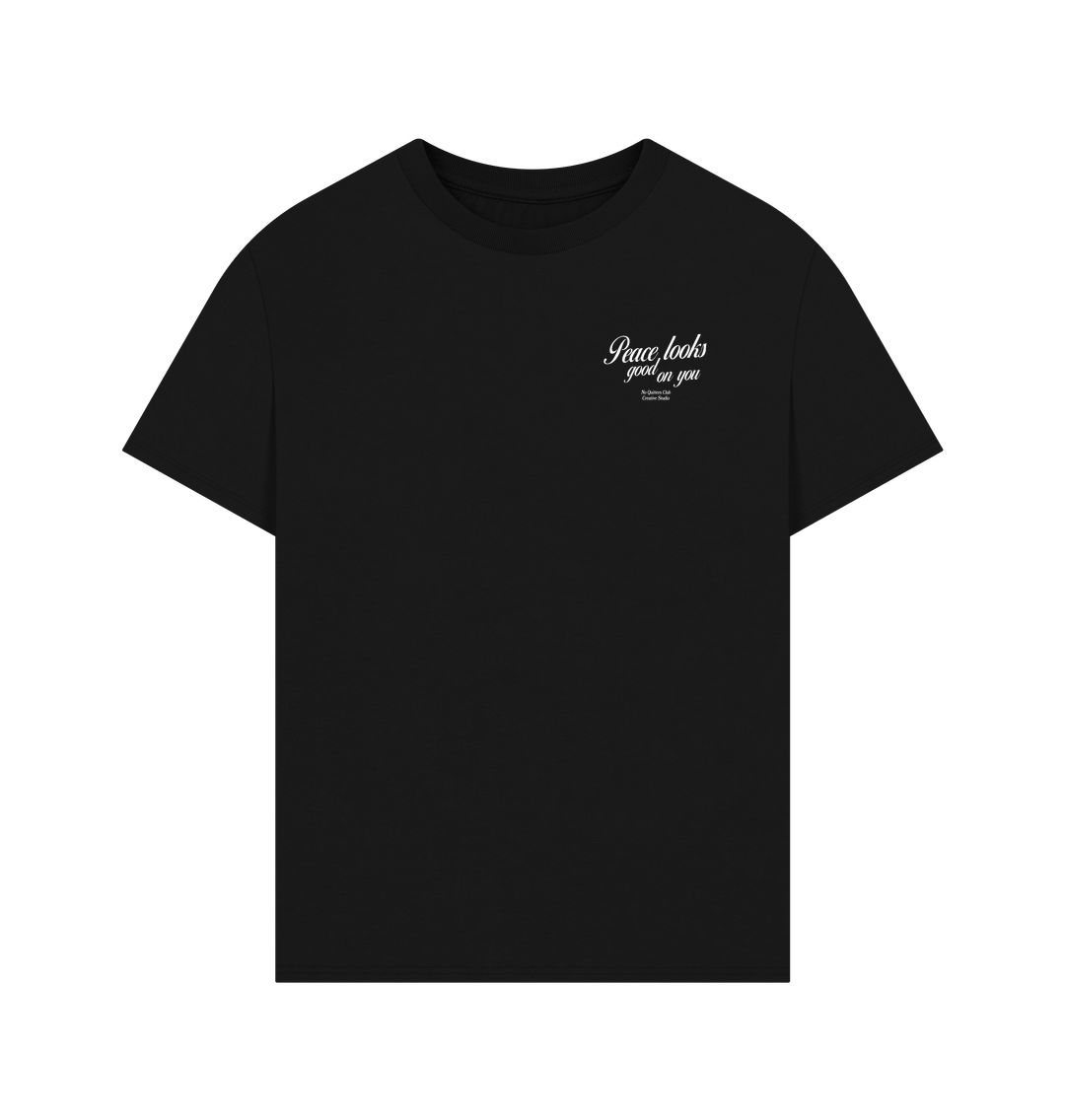 Front view of black oversized t-shirt with “Peace Looks Good on You” quote, crafted in organic cotton for everyday mindful wear.