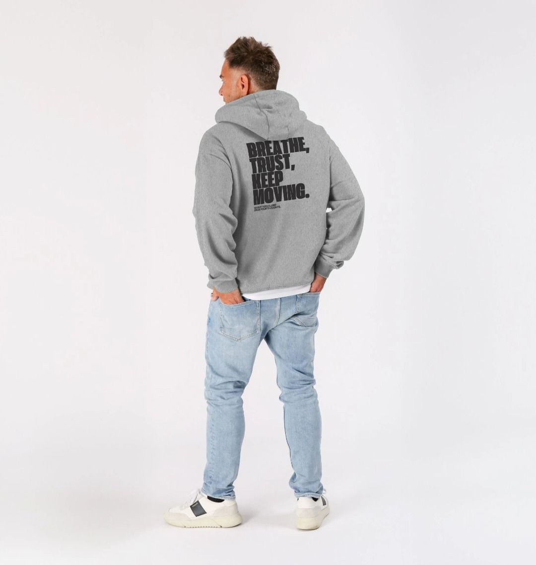 Oversized gray hoodie with motivational quote