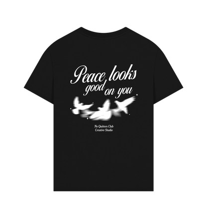 Oversized black streetwear tee made from sustainable organic cotton, featuring bold message promoting inner peace and self-expression.