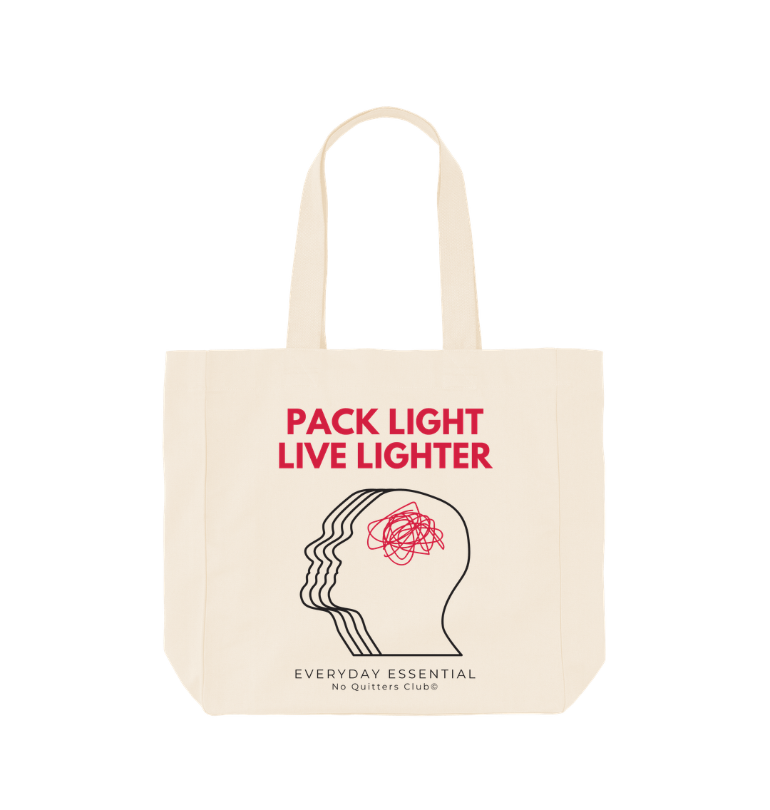 Minimalist organic cotton tote bag with "Pack Light, Live Lighter" quote – sustainable streetwear accessory for daily essentials